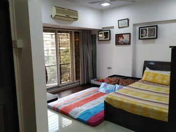 Bedroom in 1 BHK Apartment at Ahuja Sea Crown, Kandivali West – for Rent