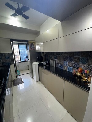 Kitchen in 1 BHK Apartment at Gundecha Marigold, Kandivali East – for Sale