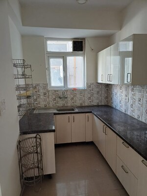 Kitchen in 2 BHK Apartment at NK Sharma Savitry Greens, Lohgarh – for Rent