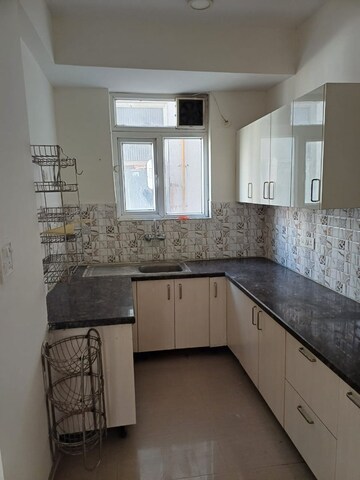 Kitchen in 2 BHK Apartment at NK Sharma Savitry Greens, Lohgarh – for Rent