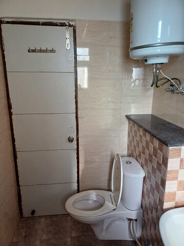 Bathroom in 2 BHK Apartment at NK Sharma Savitry Greens, Lohgarh – for Rent
