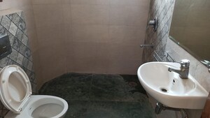 Bathroom in 3.5 BHK Apartment at Ambience Island Lagoon, Sector 24 – for Rent