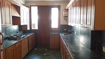 Kitchen in 3.5 BHK Apartment at Ambience Island Lagoon, Sector 24 – for Rent