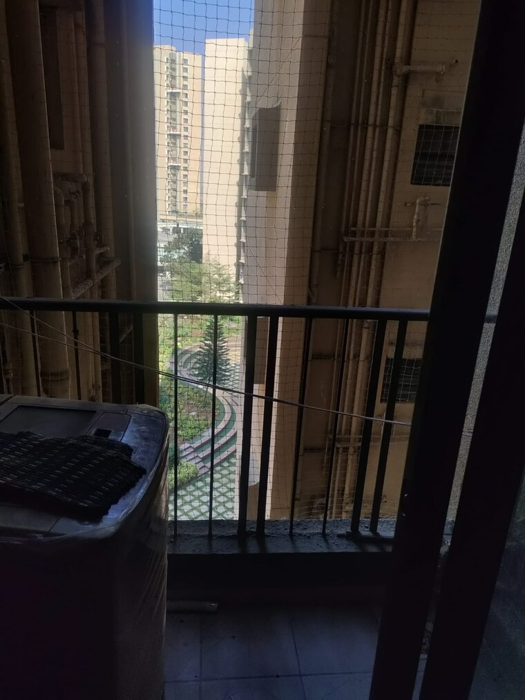 Balcony, pride-world-city-long-island 1.5 Bedroom 815 Sq.Ft. Apartment In Charholi Budruk Pune 9445374