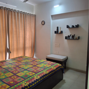 Bedroom in 1.5 BHK Apartment at Amal Aspen Park, Sonawala Industry Estate – for Sale