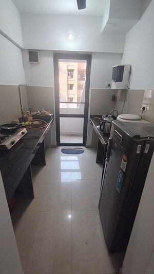 Kitchen in 1 BHK Apartment at Lodha Palava City Lakeshore Greens, Dombivli East – for Rent