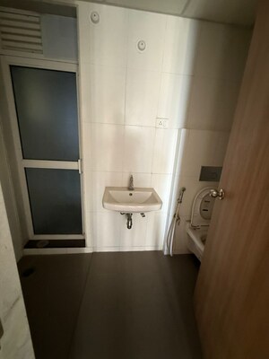 Bathroom in 1.5 BHK Apartment at Godrej Emerald, Ghodbunder Road – for Rent