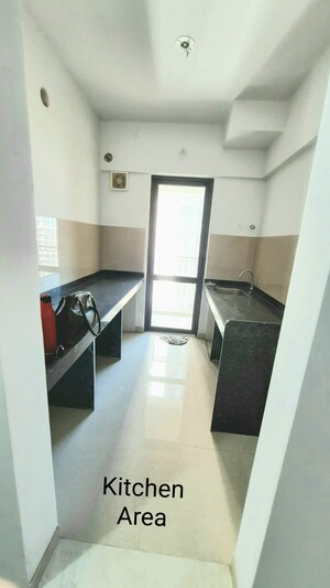 Kitchen in 1.5 BHK Apartment at Lodha Palava City Lakeshore Greens, Dombivli East – for Sale