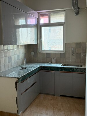 Kitchen in 2 BHK Apartment at Nilaya Greens, Raj Nagar Extension – for Sale