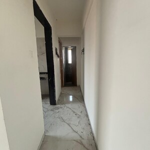 Building Lobby in 2 BHK Apartment at Paradigm Zenith Pushpanjali Residency Phase III, Owale – for Sale