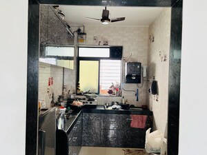 Kitchen in 3 BHK Apartment at Gurukiran Apartment, Ghansoli – for Sale