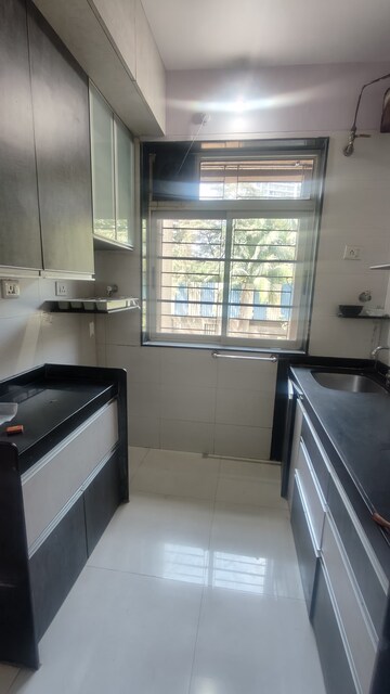 Kitchen in 2 BHK Apartment at Vasant Fiona, Pokhran Road No Two – for Rent