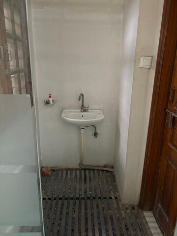 Bathroom in 3 BHK Builder Floor at Ansal API Palm Floors, Sushant Golf City – for Rent