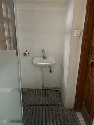 Bathroom in 3 BHK Builder Floor at Ansal API Palm Floors, Sushant Golf City – for Sale