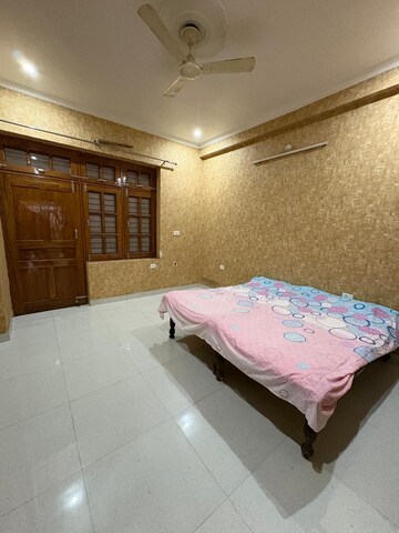 Bedroom in 3 BHK Builder Floor at Ansal API Palm Floors, Sushant Golf City – for Sale