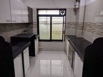 Kitchen in 1 BHK Apartment at Powai Jaltarang CHS, Powai – for Rent