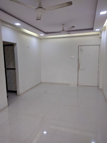 Living Room in 1 BHK Apartment at Powai Jaltarang CHS, Powai – for Rent
