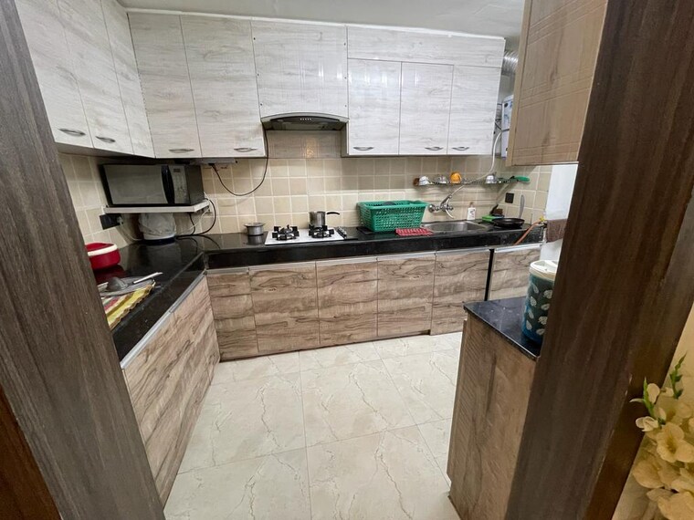 Kitchen, paras-seasons 3.5 Bedroom 1595 Sq.Ft. Apartment In Sector 168 Noida 9447456