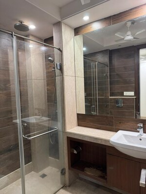 Bathroom in 3 BHK Apartment at Nehru Enclave – for Rent