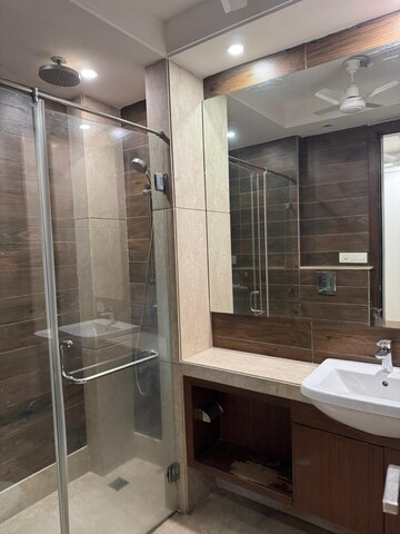 Bathroom in 3 BHK Apartment at Nehru Enclave – for Rent