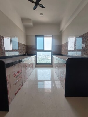Kitchen in 2 BHK Apartment at Rajesh Raj Infinia, Malad West – for Rent