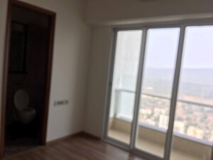 Building Lobby in 2 BHK Apartment at Omkar Alta Monte, Malad East – for Sale