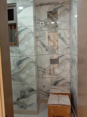 Bathroom in 3 BHK Builder Floor at Mahavir Enclave – for Sale