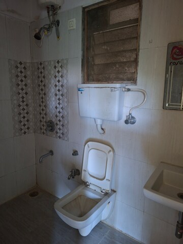 Bathroom in 2 BHK Apartment at Rosa Gardenia, Ghodbunder Road – for Rent