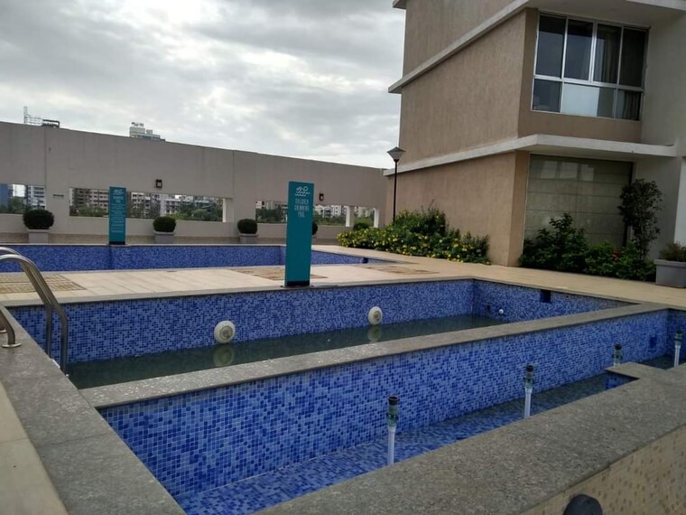 Swimming Pool, divine-aspen-garden 2 Bedroom 755 Sq.Ft. Apartment In Goregaon East Mumbai 9447965