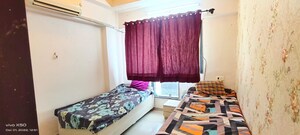 Bedroom in 2 BHK Apartment at Satellite Garden, Goregaon East – for Sale