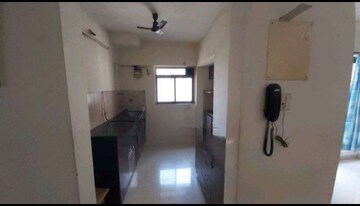 Kitchen in 2 BHK Apartment at Runwal Garden City, Balkum Pada – for Rent