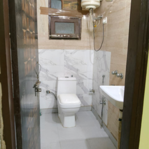 Bathroom in 1 BHK Builder Floor at Chattarpur – for Sale