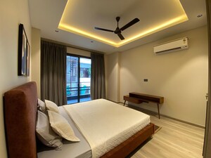 Bedroom in 4 BHK Builder Floor at Dlf Phase ii – for Rent