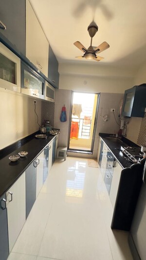 Kitchen in 2 BHK Apartment at Adiraj Status, Nalasopara West – for Sale