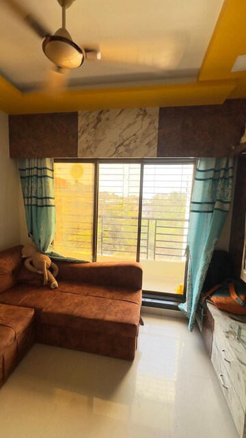 Living Room in 2 BHK Apartment at Adiraj Status, Nalasopara West – for Sale
