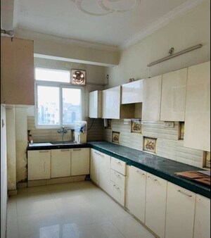 Kitchen in 3 BHK Apartment at Daliganj – for Sale