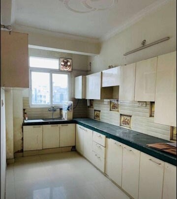 Kitchen in 3 BHK Apartment at Daliganj – for Sale