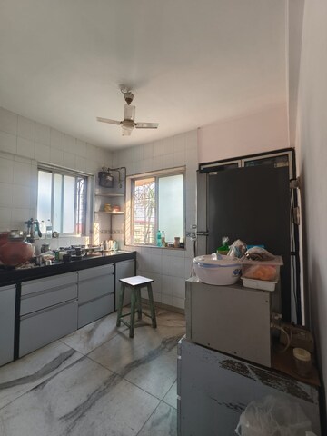Kitchen in 3 BHK Apartment at Tembhi Naka – for Sale