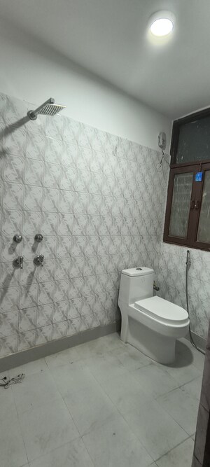 Bathroom in 1 BHK Builder Floor at Khirki Extension – for Sale