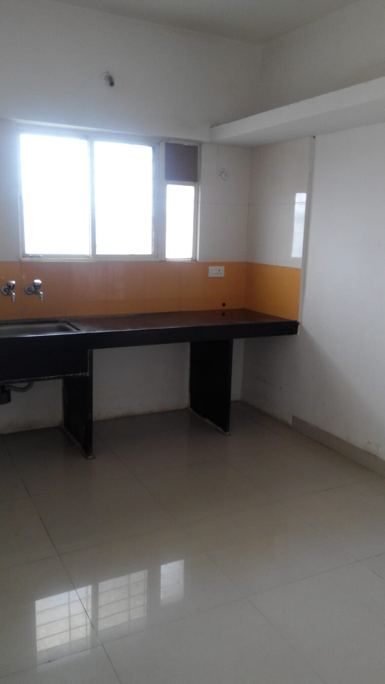 Kitchen, treasure-island 1 Bedroom 650 Sq.Ft. Apartment In Pimple Saudagar Pune 9448998