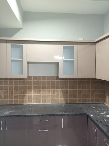 Kitchen in 2 BHK Apartment at Mahagun Mywoods, Sector 16c Greater Noida – for Rent