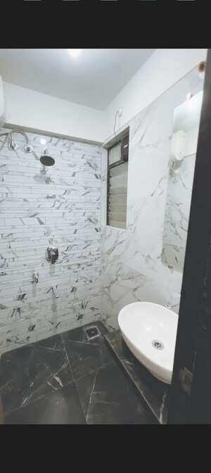 Bathroom in 1 BHK Apartment at Tharwani Vedant Millenia, Titwala – for Sale