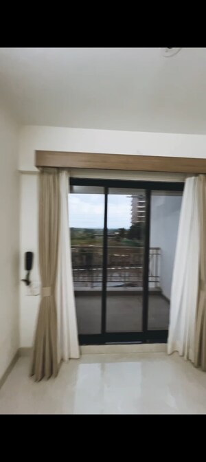 Building Lobby in 1 BHK Apartment at Tharwani Vedant Millenia, Titwala – for Sale