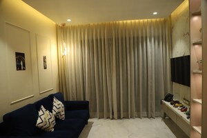 Living Room in 1 BHK Apartment at Lodha Casa Maxima, Mira Road – for Sale