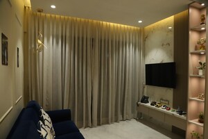 Living Room in 1 BHK Apartment at Lodha Casa Maxima, Mira Road – for Sale