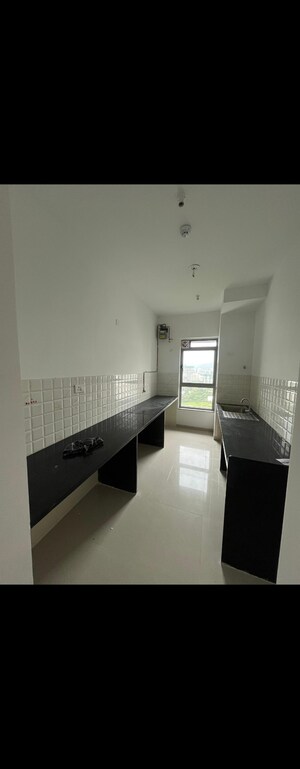 Kitchen in 2 BHK Apartment at Kalpataru Immensa B, Kolshet Road – for Rent