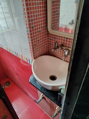 Bathroom in 1 BHK Apartment at RNA NG Suncity Phase II, Kandivali East – for Sale