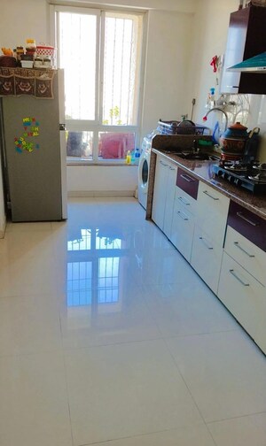 Kitchen in 2 BHK Apartment at Puranik Rumah Bali, Ghodbunder Road – for Sale