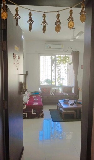 Living Room in 2 BHK Apartment at Puranik Rumah Bali, Ghodbunder Road – for Sale