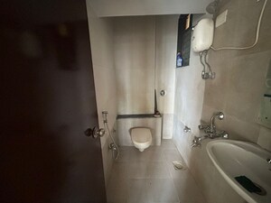 Bathroom in 1 BHK Apartment at Vihang Valley Phase 2, Kasarvadavali – for Sale